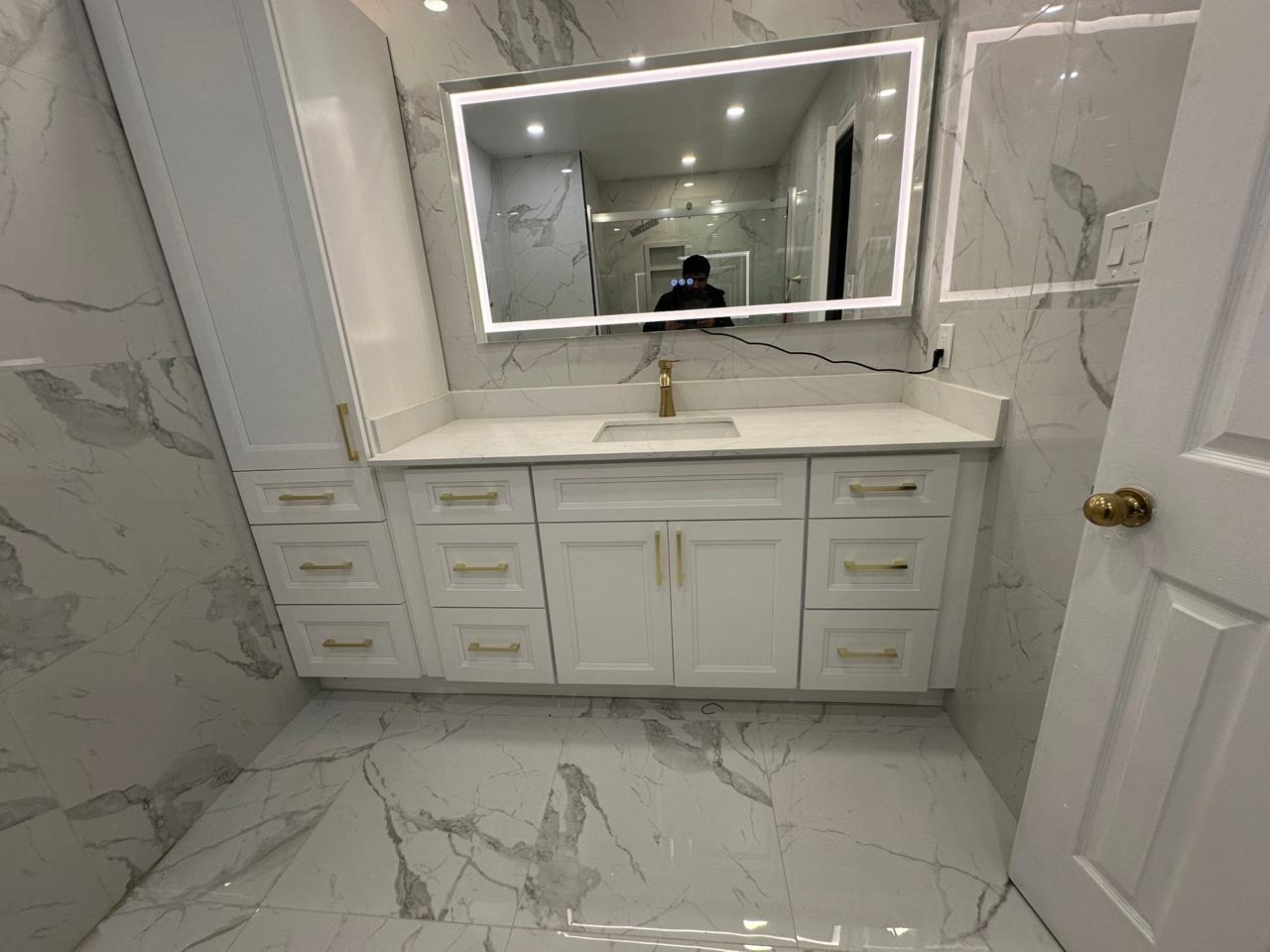 Bathroom vanity with gold hardware